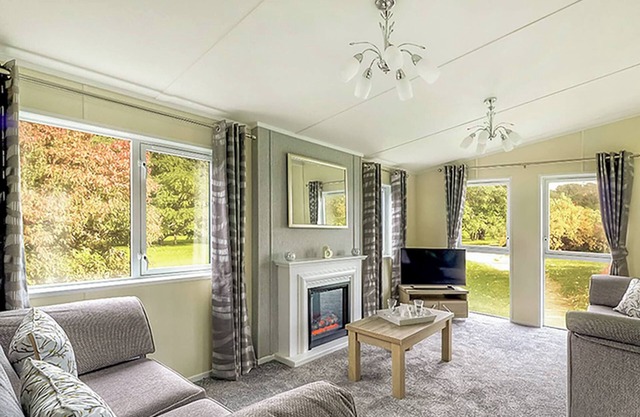 Brand new in 2019. Modern four bedroom lodge with two doubles, one with en suite.
