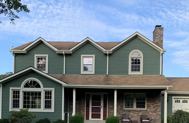 4 bedroom home with spacious deck and backyard