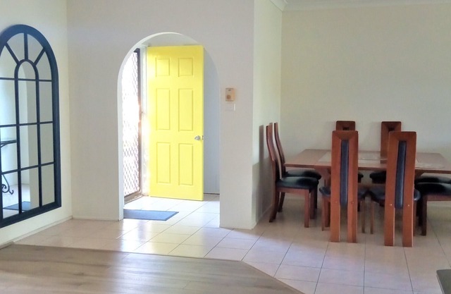 4 bedroom house. Walk to Restaurants, River, Beaches, Boat ramp. Deck with view.