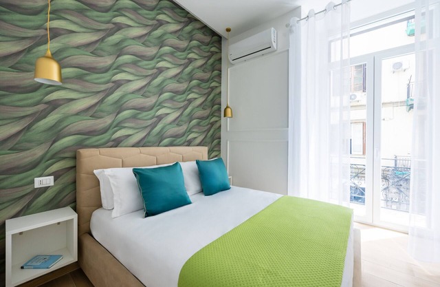 4 Stelle Housing - Queen Room by Wonderful Italy