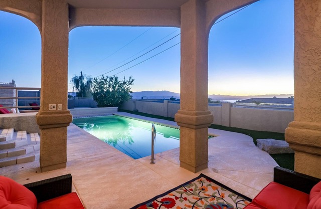 5 bed/4bath pool home with FOREVER Lake Views and LOADS of off street parking!!
