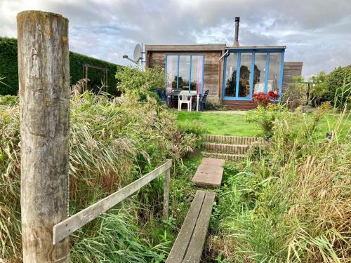 4pers - House w Sauna, Winter garden fishing pier in front of the Lauwersmeer