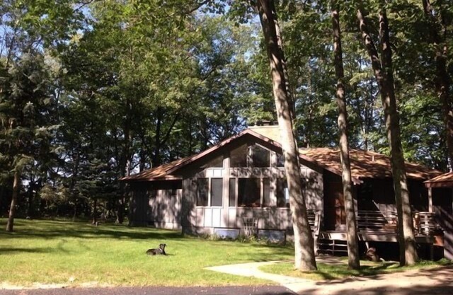 5 chambres, 4 salles de bains avec vue sur le lac Portage et accès à la plage.