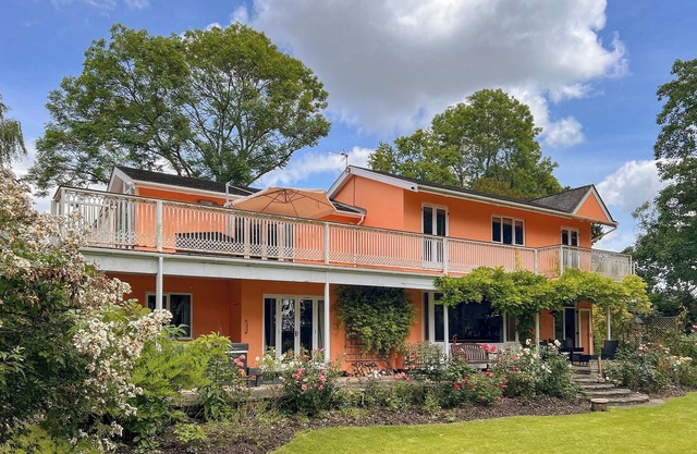 This stunning waterside retreat offers an amazing space for larger families and friends.