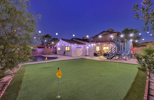 Fun five bedroom home by the strip. Pool, putting green, games, fully loaded!!!!
