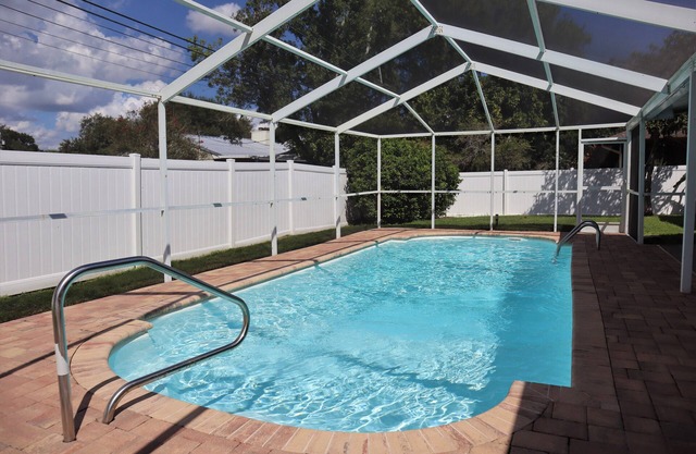 5 miles to Clearwater Beach Fun! Spacious Pool Home w/ Yard!
