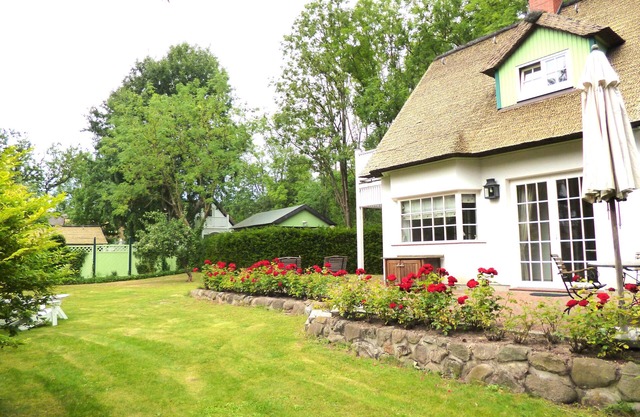 Maison de vacances "Phare" 2-4 personnes avec cheminée, internet WiFi et grand jardin