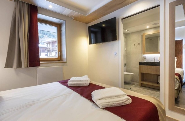 150m du centre station, remise en forme, piscine, sauna, hammam, balcon, cheminée ou poêle à bois