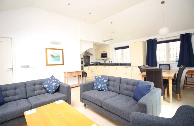 50m from the beach, dog friendly with patio garden