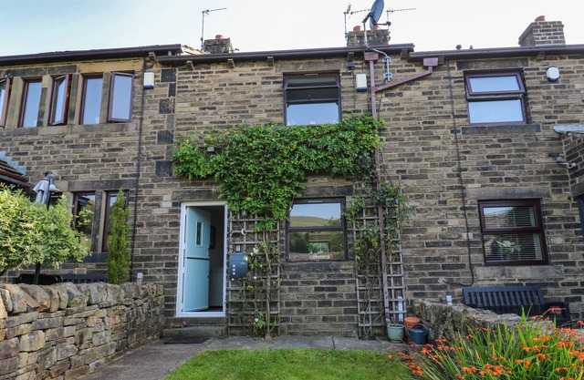 52 DELPH ROAD, pet friendly, with a garden in Delph