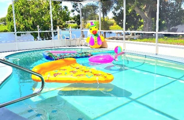 #55 The Lakeside Oasis Pool Home by Joyful Moments