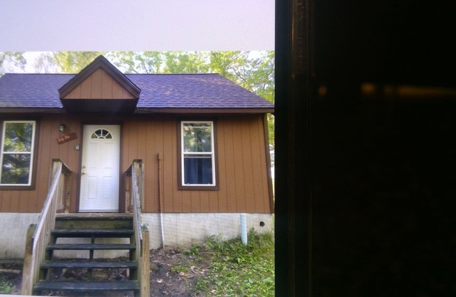 6 acres leading down to the WI. river and only 4 mins to downtown Wis Dells!