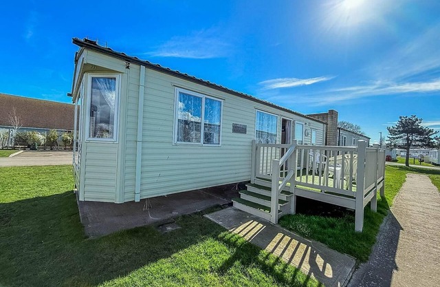 6 berth caravan with decking at Naze Marine Holiday Park ref 17071P