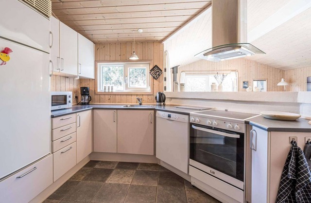 Maison de vacances pour 6 dans un parc de vacances a Henne