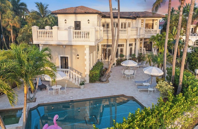 7BR Downtown Waterfront Mansion with Heated Pool!