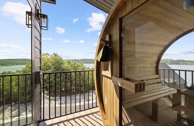 8 bdrm / 4000+ sqft home w/ golf simulator, outdoor sauna, hot tub & lake views!
