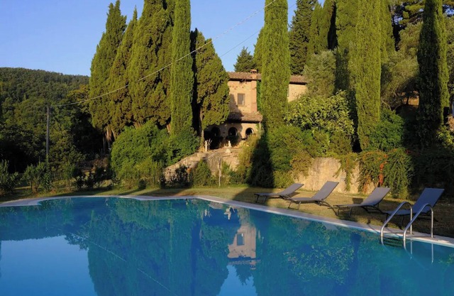 A beautiful villa in the heart of Tuscany. Spacious grounds with large pool.