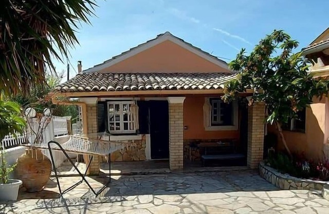 a flower house in Corfu close to beach and town