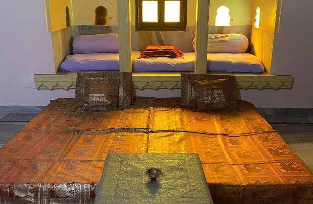 A heritage room in udaipur overlooing the city palace