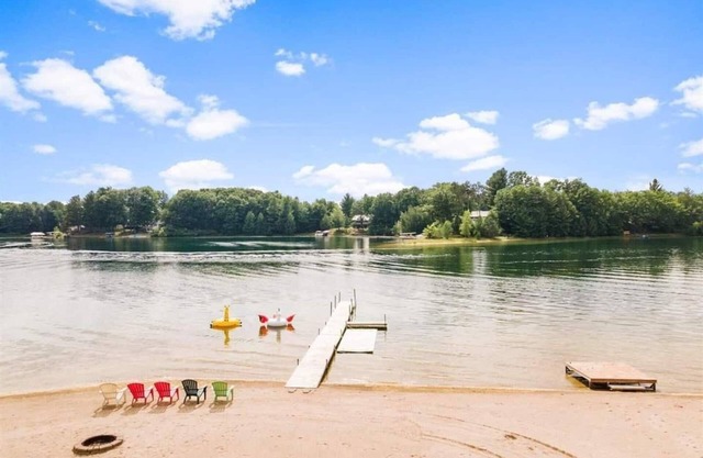 A lakeside retreat that checks all the boxes for a fun family getaway all year-round!