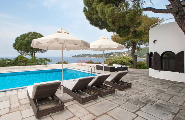 A beautiful traditional villa with pool, sea view and private beach