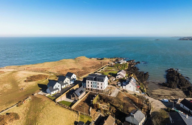 A modern costal dormer bungalow in the scenic Bull Bay, offering stunning coastal views for up to 7 guests
