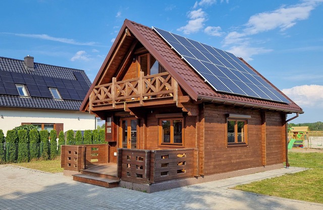 A modern house with a large garden and a place for relaxation + fun for children