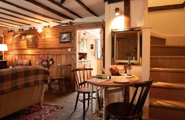 Spadgers, a flax workers cottage next to fields in a Medieval Village