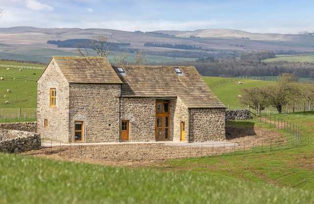 A stunning barn conversion sleeping 7 guests with hot tub