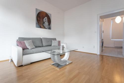 A stylish and comfortable 2 bedroom apartment with thoughtful design, private balcony, and a relaxing bathtub, making it perfect for well being and cozy city living