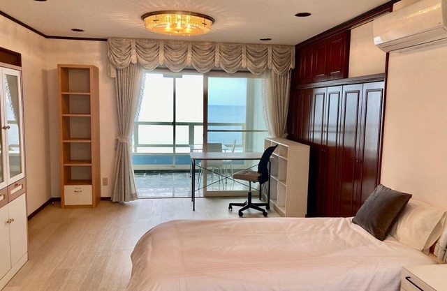 Ocean Front Room with Breathtaking Sunset View from a Large Window / Hamada Shimane