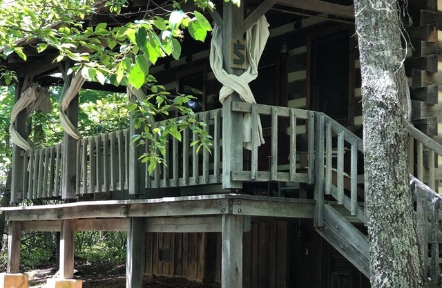 A Unique Bed and Breakfast...Log Cabins, with Hot Tubs and Breakfast Delivered Each Morning :)