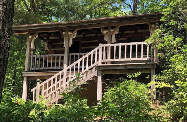 A Unique Bed and Breakfast...Log Cabins, with Hot Tubs and Breakfast Delivered Each Morning :)
