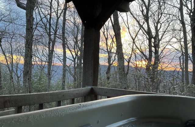 A Unique Bed and Breakfast...Log Cabins, with Hot Tubs and Breakfast Delivered Each Morning :)