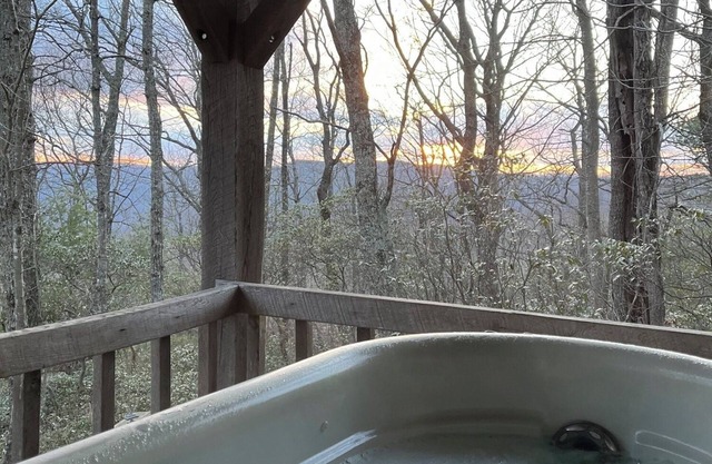 A Unique Bed and Breakfast...Log Cabins, with Hot Tubs and Breakfast Delivered Each Morning :)