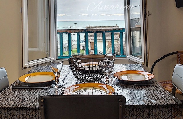 Charmant appartement avec vue sur la plage