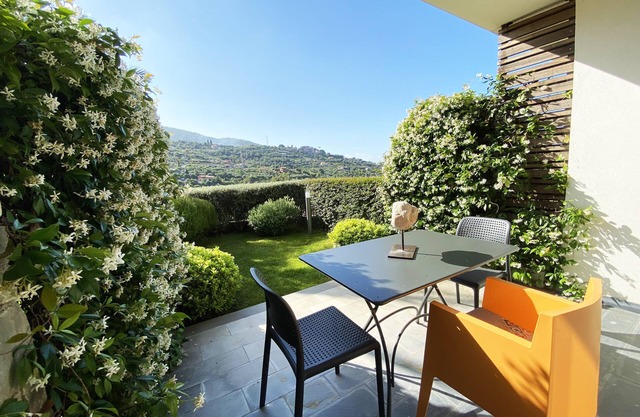 Accogliente appartamento con giardino in posizione tranquilla