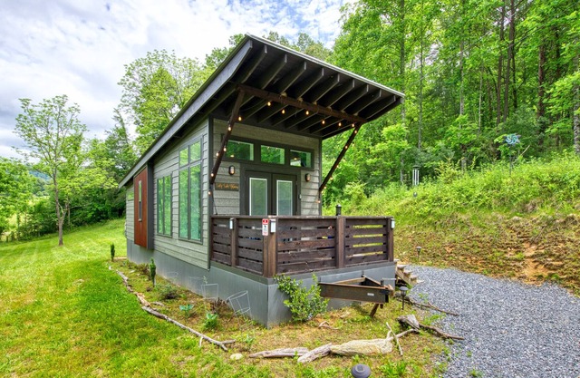 Adorable tiny bungalow with furnished, covered porch, large Smart TV, & W/D