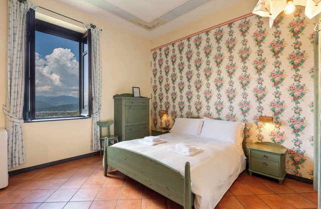 Ferme 'Camera Quadrupla Con Vista Vesuvio' avec vue sur les montagnes, piscine partagée et Wi-Fi