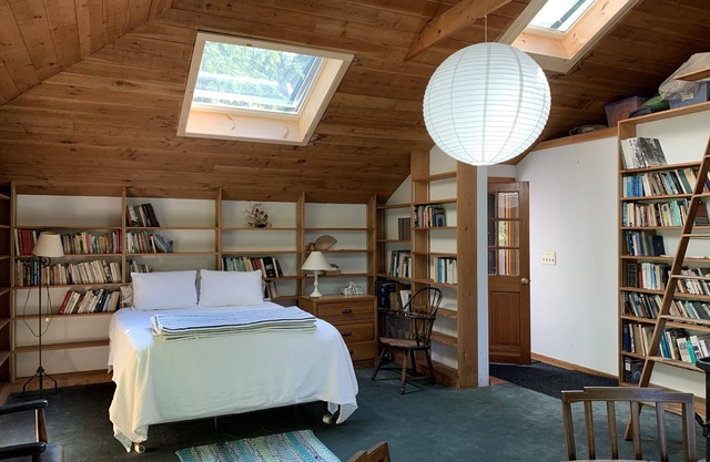 Airy, book-lined cottage on historic seaside estate with private beaches & more