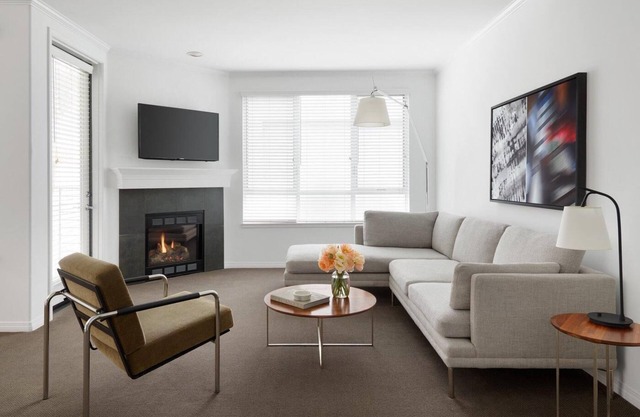AKA Residences Sprawling Suite w/ Den Space, Kitchen, Private Patio, & WiFi