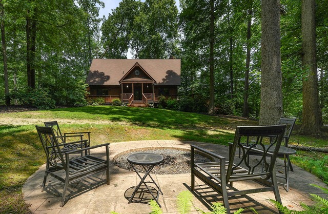 Allergy-free lakefront home with private beach, water views, firepit, & AC