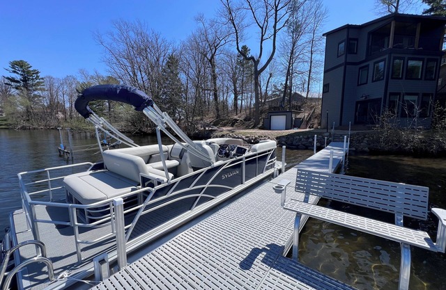 Modern 3 story Home on lakefront. 140’ + shoreline, dock w nearby boat launch