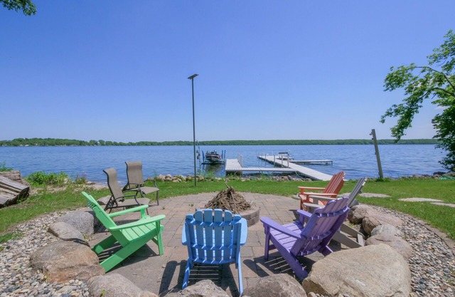 Amazing lake home on level lot with loft above garage boat included for use.