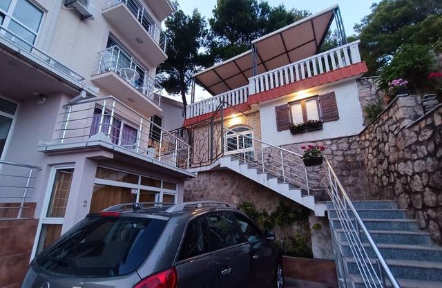 An apartment in a complex in a pine forest