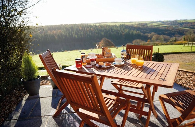 Seekings est un cottage décloisonné doté d'un patio privé offrant une vue magnifique sur la campagne.