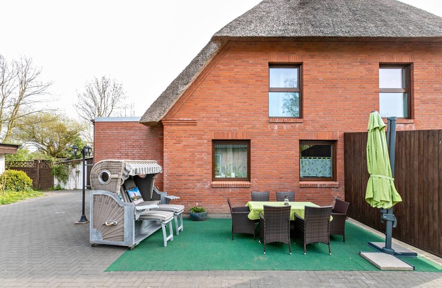 Appartement 'Ferienwohnung Nordlicht' avec jardin partagé et Wi-Fi