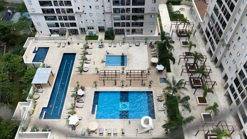Apartamento 600m da Praia 2 quartos em condominio Clube com Ar-condicionado