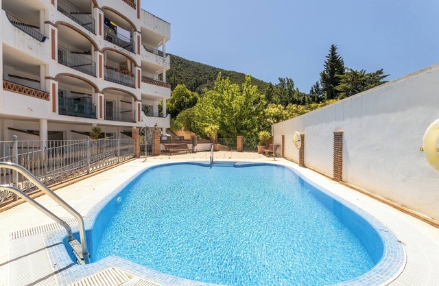 Appartement Ático Alcaucín avec vue sur la montagne, piscine, W-Fi, jardin et terrasse