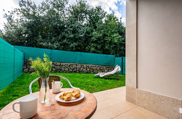 Appartement '2 Jardin 1 - Toró' avec vue montagne et jardin privé